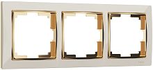 Рамка универсальная Werkel Snabb 3-м. слоновая кость/золото картинка